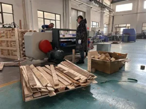 wood pallet dismantling machine working scene, recycling waste wood pallets